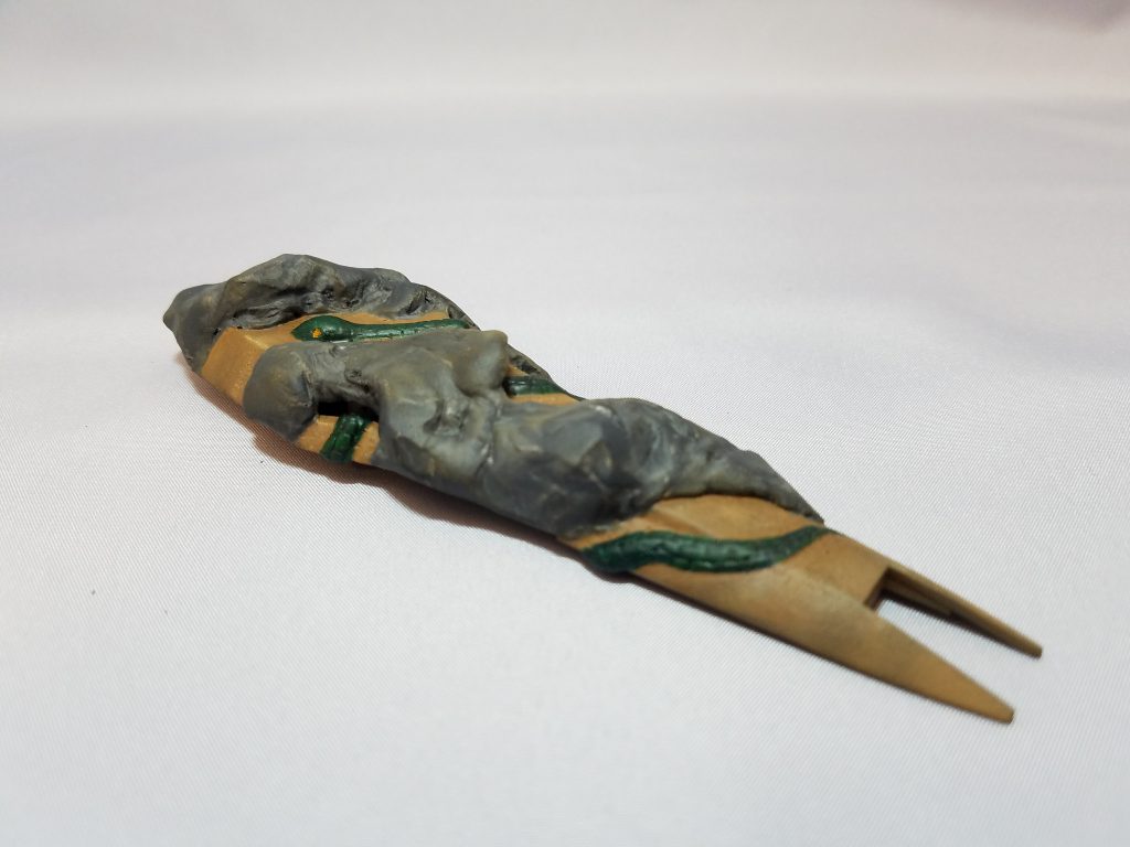 岩間を這う蛇–3枚目/制作者：ジールマン