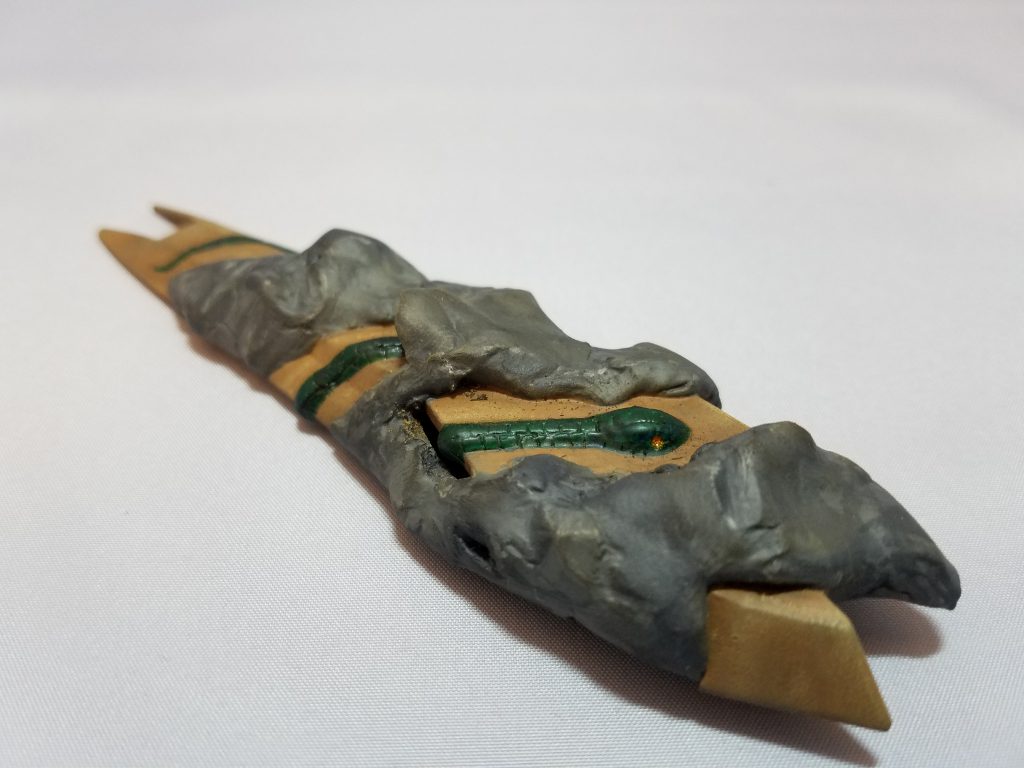 岩間を這う蛇–4枚目/制作者：ジールマン