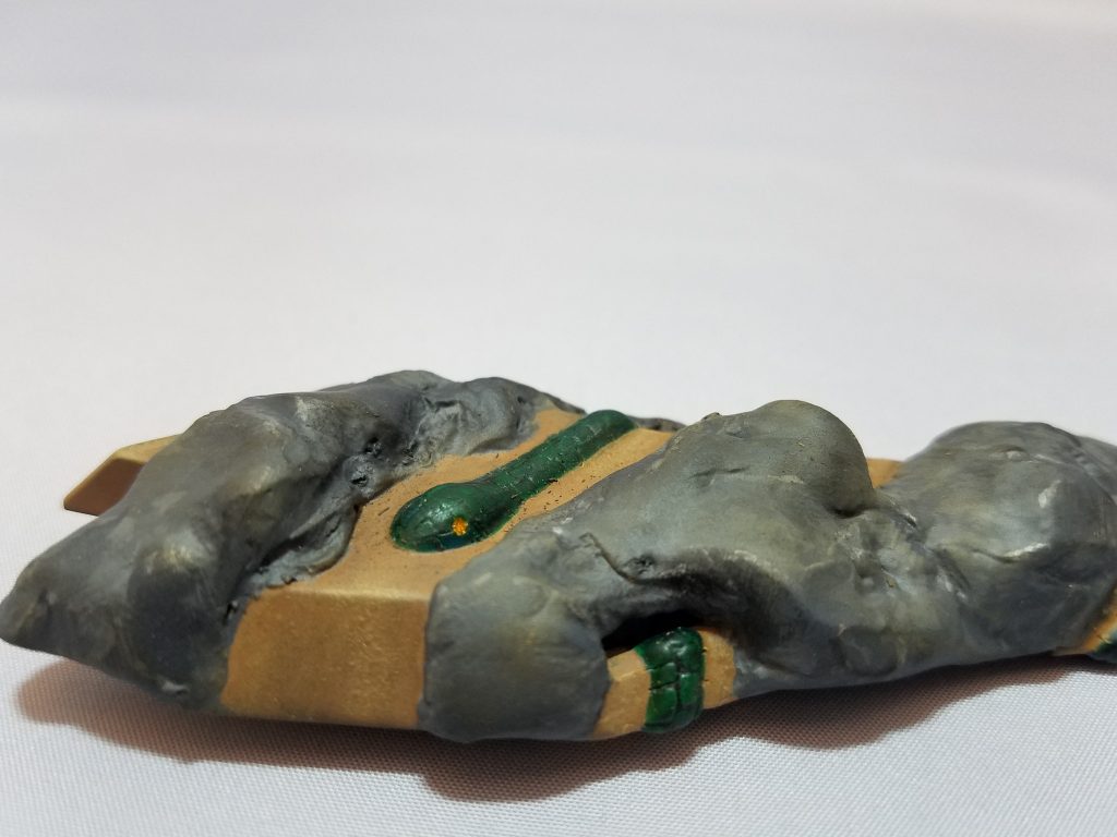 岩間を這う蛇–5枚目/制作者：ジールマン