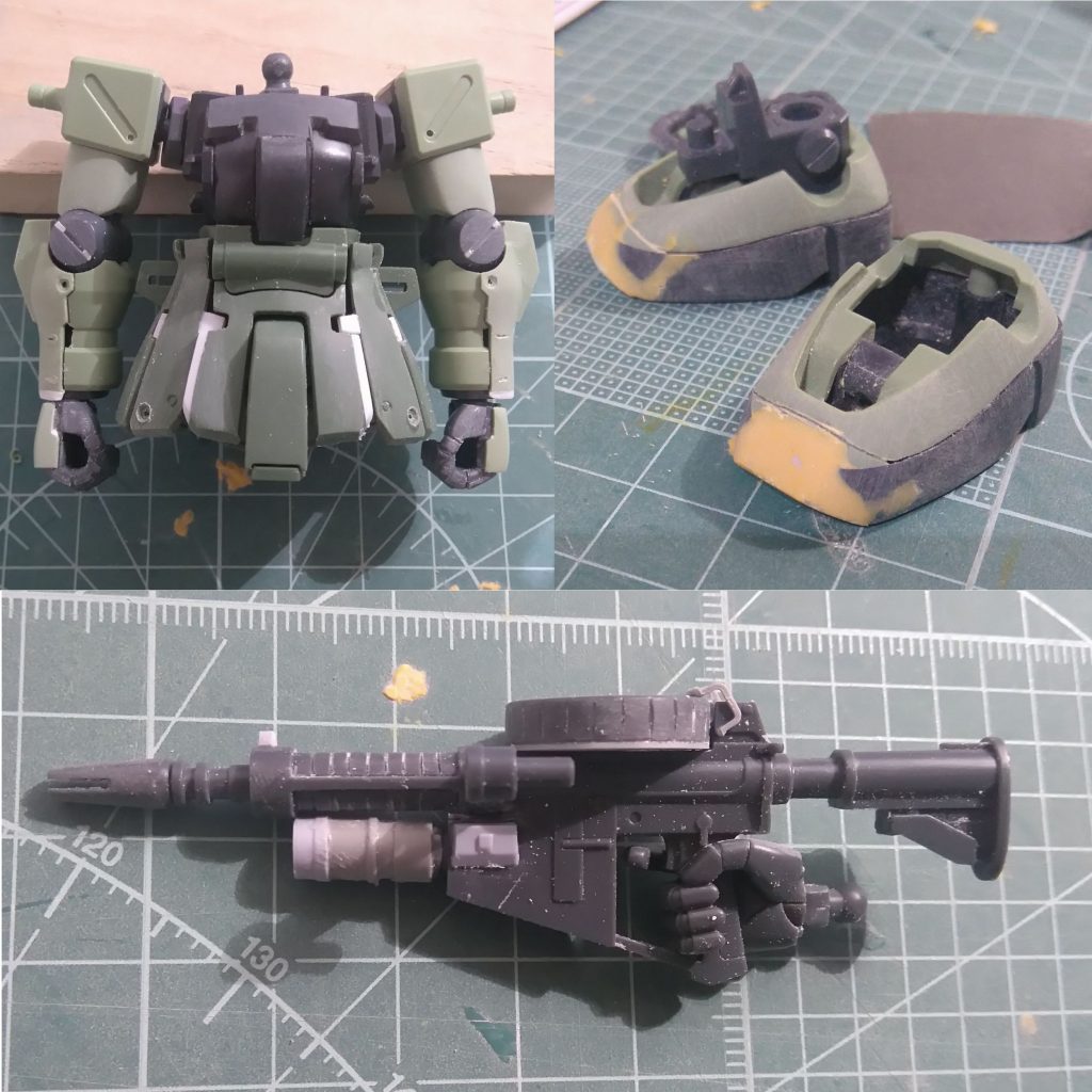 製作途中写真をいくつか。足の黒いソール部分のライン変更は、爪先底面にプラ板を張ってからポリパテで。マシンガンのグレネードランチャー部等を流用パーツで作り直し。
全体にディテールの“集中と拡散”を意識しながら、割り切るところは割り切ってサクッと。