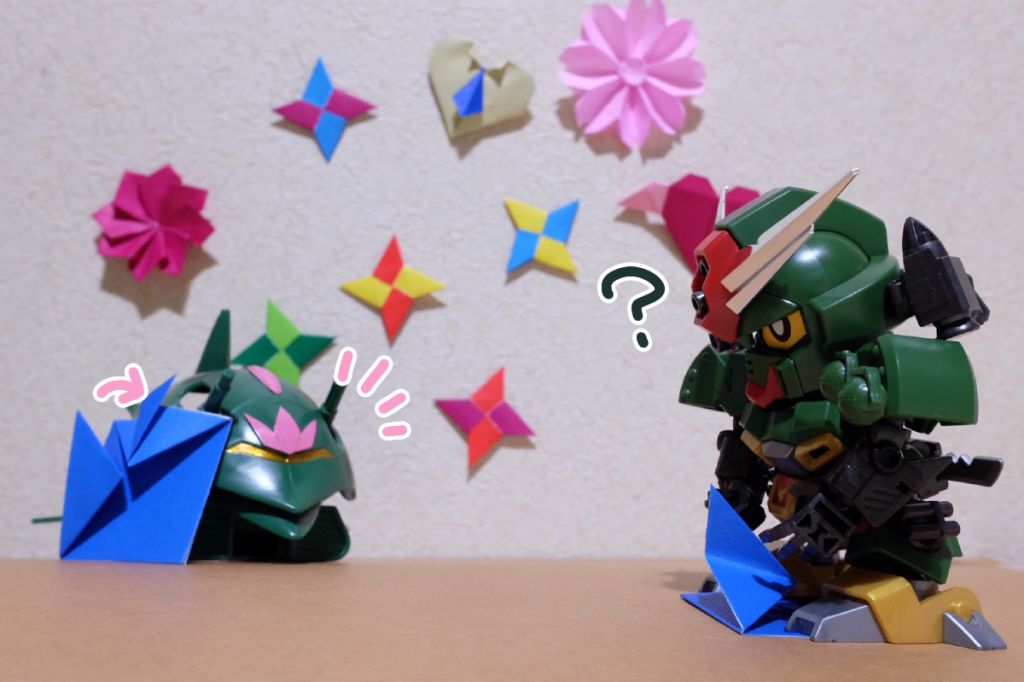 あの子:そして、さっき持っていった端っこを上に折りあげて、外側にちょこっとだけ折るの
コマンド:…? こうか?