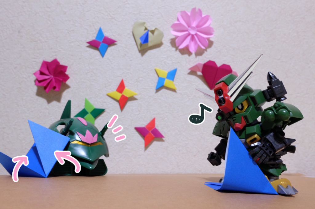 あの子:端っこを上に持って行くの
コマンド:こうだな!
あの子:それができたら、上と下を逆さに持ち変えてね