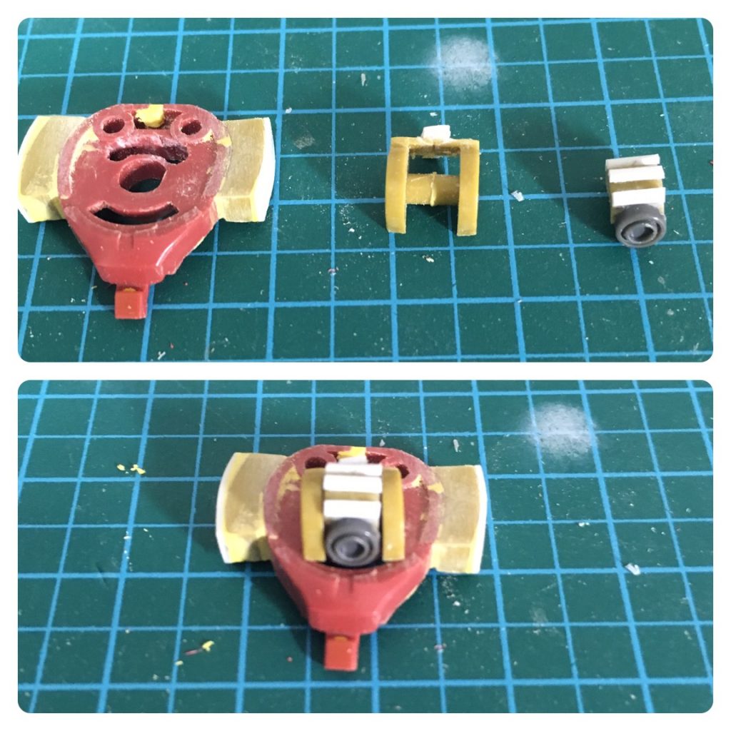 オリジンザクの頭部の中に旧キットのモノアイ構造を入れる形にしました。ほっぺの部分も旧キットを流用。プラ板で大きさを調整しました。