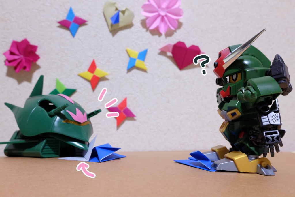 あの子:それができたら、下の二枚重なった紙を一枚めくって、少したるませるようにして、いい感じに折るの
コマンド:それも適当か?
あの子:適当な長さでいいわよ、簡単な折り紙だし