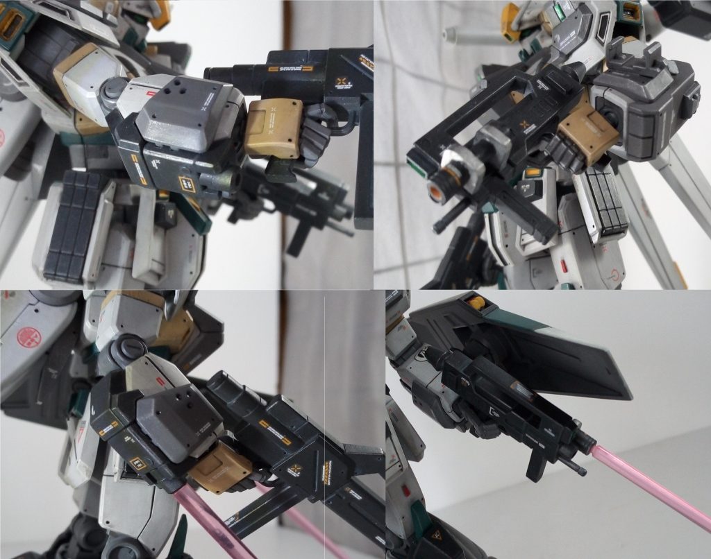 左側画像は右腕アーマーよりビームサーベルを出力した状態です。右側の画像はスタークジェガン付属のビームライフルを加工して作成したショートビームライフルです。本来の長い銃口を外し、小さいシリンダーみたいのを銃口としてくっつけてます。ビームサーベルをマウントしているため、銃剣のようにビームサーベルを出力する事も出来ます。左腕アーマーはスタークジェガンの物をそのまま使っていますので、内部に予備のビームサーベルを内蔵している設定です。