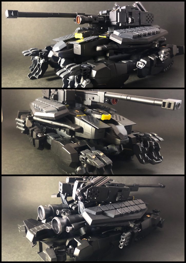 ## 超大型戦車「霊亀」(レイキ)
ベースジャバーを改造した巨大な戦車で、ゲンブの強化ユニット。
名前の由来は霊亀という四霊・瑞獣の一種で、山を背負った亀の姿をしている点から、ゲンブと亀繋がりという事で名付けられた。
レイキと合体することで、ゲンブは他の四神同様に大型MBへの変形合体が可能となる。
大量の火器を搭載しており、その火力は戦車というより小型の戦艦に近い。
砲塔部分は分解して、クロガネの武装になる(後述)。
また、元はSFSなので飛行は可能だが、この形態では長時間・高速での飛行は難しい。
武装
・主砲及び砲塔部分(主砲1、対空ビーム砲4、6連ミサイルポッド2、小型ミサイルポッド2)
・後部対空ミサイル×12
・シェルビット(防御、エネルギー補給用のビット)×6
・先端部マインプラウ(地雷除去装置)
・3連スモークディスチャージャー×2