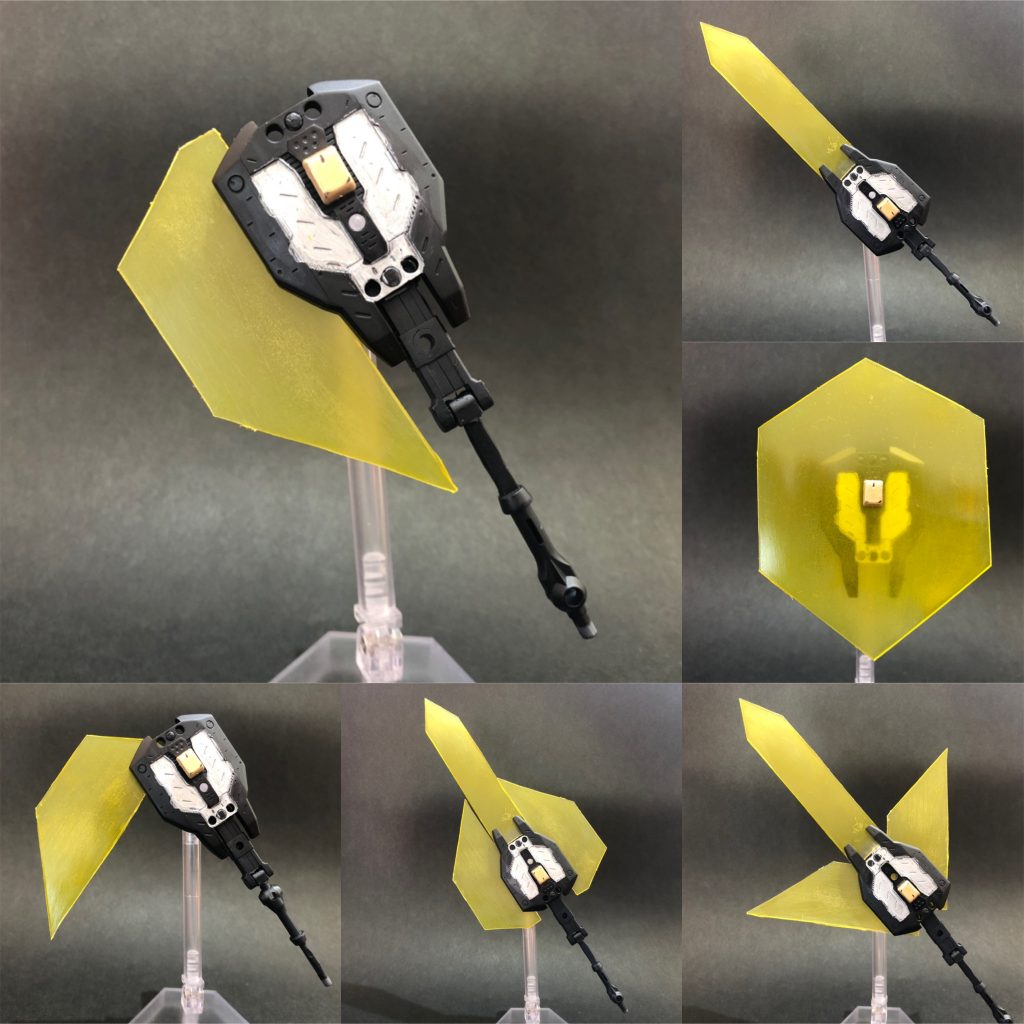 ## ・万能盾「武御雷(タケミカヅチ)」
こちらも雷神の名を冠した、片手用の盾。
変形機構とビームの形状によって様々な武器として使える(大剣、斧、鎌、ビームシールド、出力を上げて必殺剣、等々)。
基本的にはそのまま盾として用いることが多い。
火雷より軽量なため手数が出しやすく、場合によってはこちらをメイン武器として使用する。
しかし盾としては重過ぎるため、やはり普通のMSでは扱えない。

(写真の都合で、この武器の活躍は次回に持ち越し…)