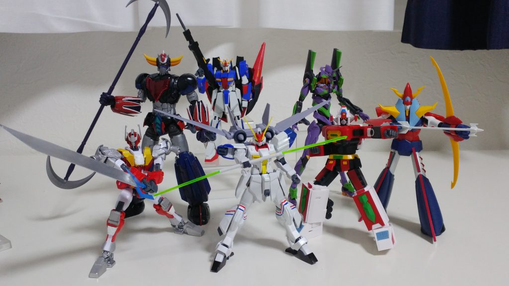 いろんなロボのフィギュアやプラモを並べてスパロボっぽい感じで