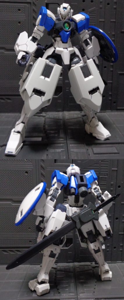 通常形態前後戦闘によって大破したガンダムラージネスを修復。大腿部を覆う粒子貯蔵タンク・スラスターを兼ねる追加装甲を装備。武装を懸架するプラットフォームの機能は臀部に標準装備となった。本体内部にELSが擬態した模倣GNドライブ「GNドライブ［E］」を1基搭載。スラスターはメイン1に可動式サブ2の構成に変更。