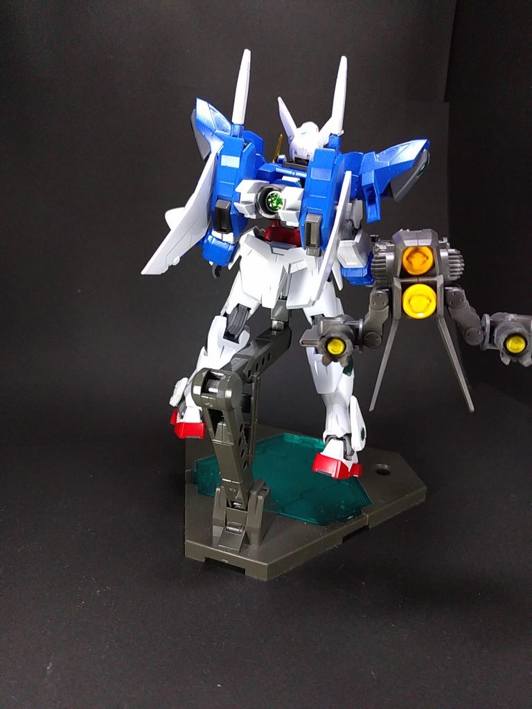 ELSとの戦闘時、ELSと対話を試みた刹那･F･セイエイが命を落としかけた事を重く見たイアンは、自身のトラウマとも言うべき「コア･ファイター」の搭載を決意する。
マイスターはイノベイターに覚醒したCBメンバーを想定しているが、宇宙の彼方に旅たった刹那の搭乗も視野に入れ、彼の無事の帰還を願い、彼の愛機「エクシア」の新たな姿として開発が進められた。