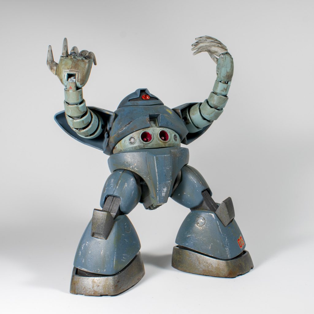 He throws up his badly weathered arms in frustration.