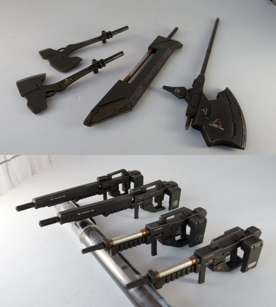 武装はグレイズの一般的な120mmライフルとアックス、
グシオンリベイクが使用したテイワズ製のロングレンジライフルとハルバード、ユーゴーが使用したバスターソード等、複数の勢力の物様々です。