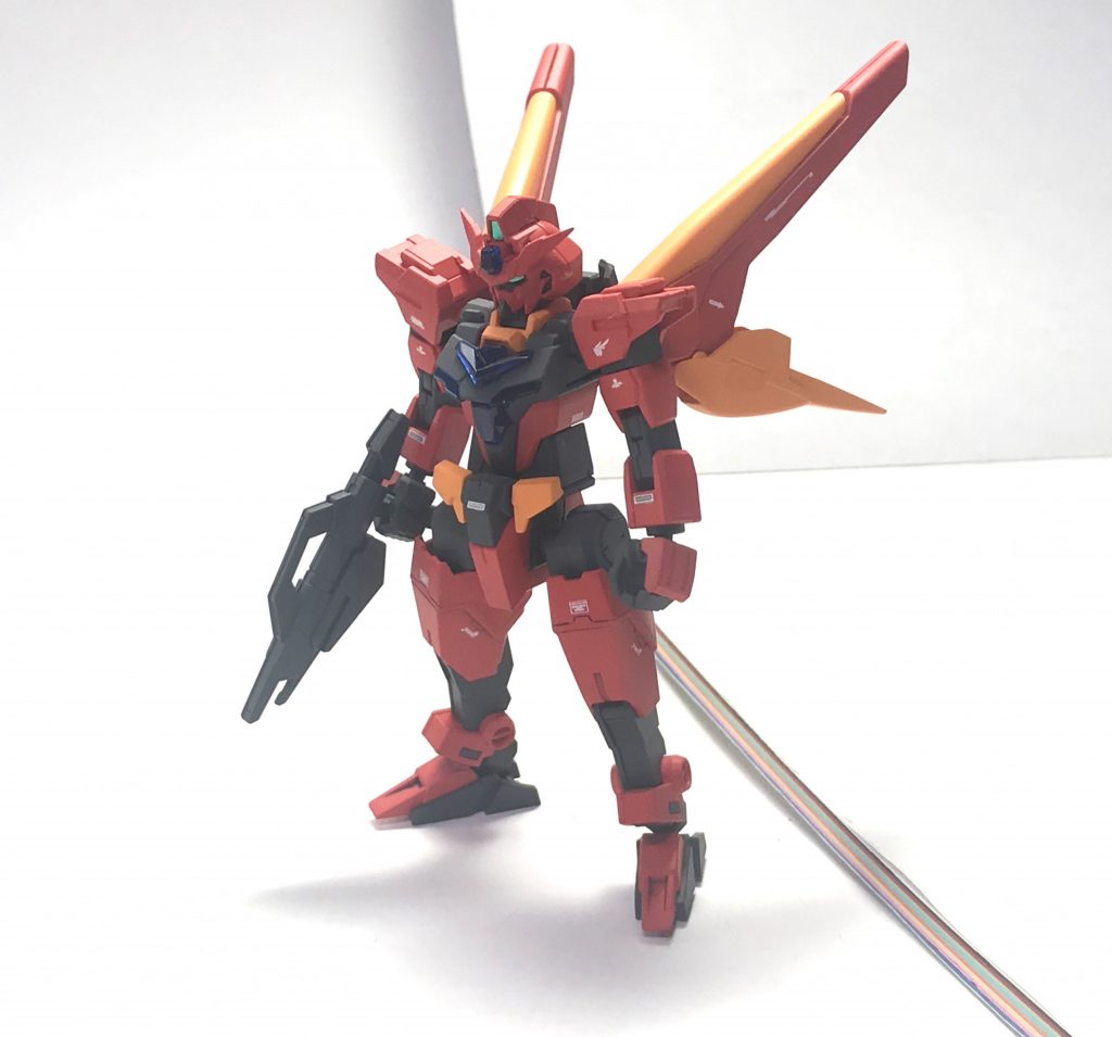 コアガンダム・リミテーションP9。本機はGBN開発スタッフの一人が、ELダイバーとその発生原因とされている「想い」の余剰データを発見すべくログを辿っていた中でクラッシュ状態にて発見された謎のスプライトデータを可能な限り復元し、欠損部分を「コアガンダム」で検索したところ発見したキャプテン・ジオンの紹介動画及び、ダイバー「マギー」経由で紹介された動画に映った開発スタッフすらその詳細を知り得ない「エルドラ」なるシークレットミッションの大地に立つコアガンダムIIの姿を参考に補っている。