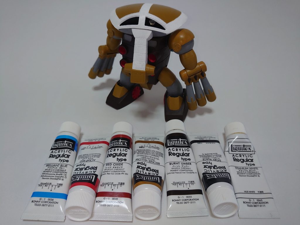 塗装はリキテックスのアクリル絵の具を使用。チタニウムホワイト、アイボリーブラック、バーントアンバー(焦げ茶色)、ブロンズイエロー(黄土色)、レッドオキサイド(茶色)、アクラレッド(赤)、ブリリアントブルー(水色)画像にはありませんが、ピュアレッドを一回塗ってからアクラレッドに塗り重ねてます。一発では塗れないので薄めに塗った後食い付きが良くなってから濃いめに塗り、足りないところを再び薄塗りしてます。