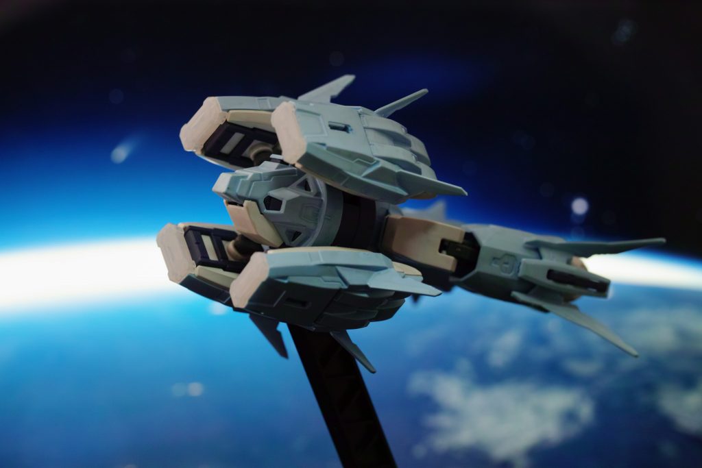 プトレマイオスアームズ。
GNコンテナビット4機を搭載する。基本的にはシェヘラザードと同等のもの。
同じ個体を流用しているのか、いわゆる2番機に当たるのかは不明。