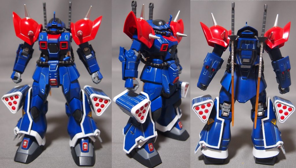 脚部に増加装甲とバルカン砲を付け、背中にヒートソードを装備した3面図。