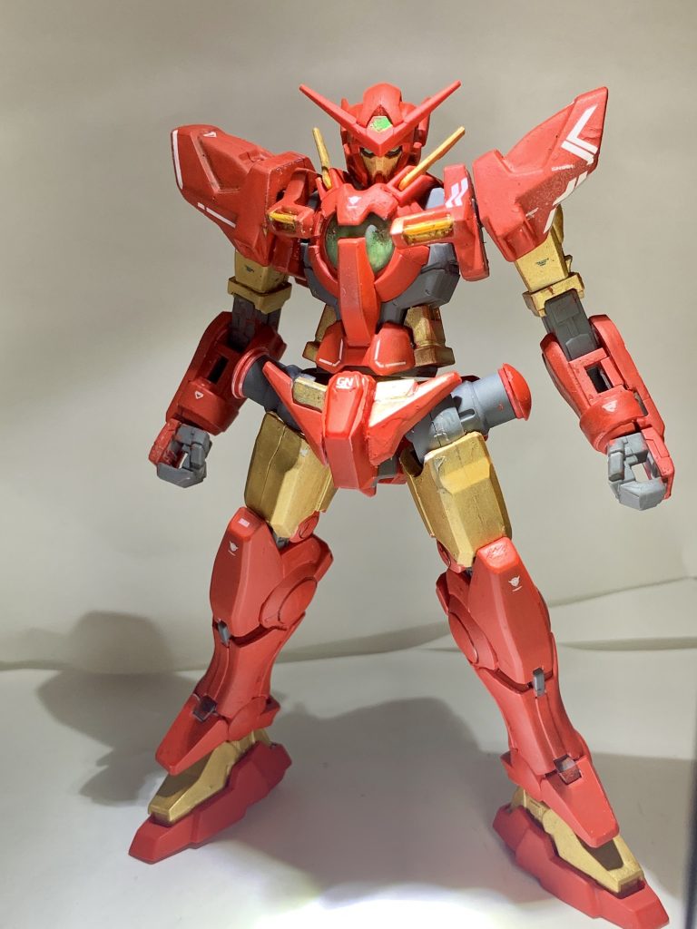 エンドゲーム後MCU世界線からセカンドシーズンくらいの00世界に異世界転生したトニー・スタークことアイアンマンが武力による戦争根絶を目指すソレスタル・ビーイングの科学者としてイアンと共に作り上げた機体。エクシアの予備パーツをベースにナノマシーンで強化する形で建造されたので見た目はエクシア。パイロットはスターク自身が担当する。