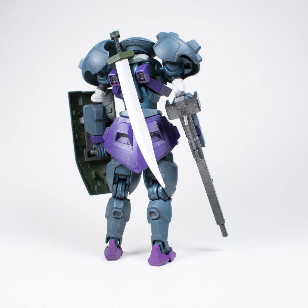 The back features a magnet mount for the sword.