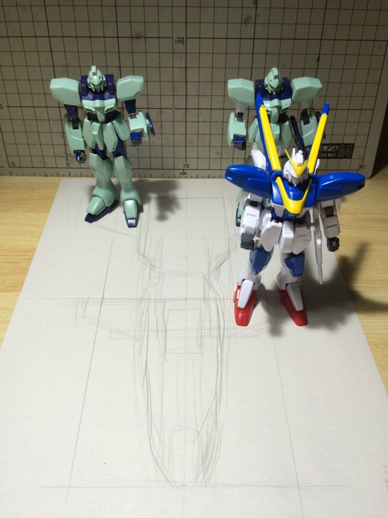 【制作工程1】2014年の秋「誰も作ってないみたいだし、形がシンプルだからできそう!」と思い付いて、作り始めました。写真はA4の紙を使って全長を出しているところです。設定画が少ないので映像を見ながらイメージを膨らませていきました。