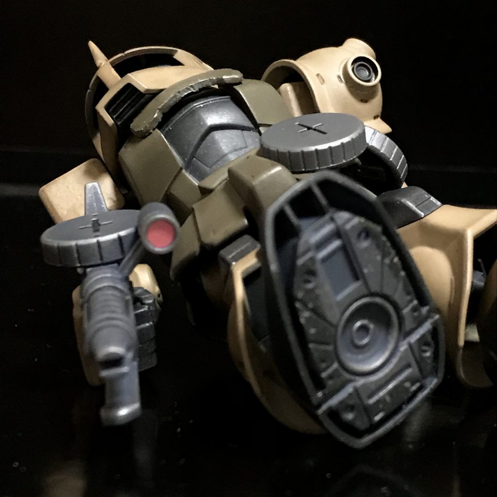 (トップ)デルまで… ゲリラ風情が!シローに股関節を破壊されて倒れ、シローに向けてマシンガンを放つところ。