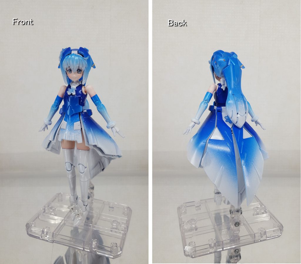 写真が暗いですが、頭頂部から足下にかけて、夜に雪が降り積もっているようなイメージになるように作成しました。塗装は缶スプレーを使用し、一部筆で塗っています。使った物は割とめちゃくちゃです。髪 クレオス Mr.カラースプレー ホワイト(下地) クレオス Mr.カラースプレー クリアーブルー クレオス Mr.カラースプレー ホワイトパール タミヤ  スプレー塗料    クリヤーブルー タミヤ  スプレー塗料    クリヤー ガイアカラー ブライトゴールドボディ タミヤ  スプレー塗料    レーシングブルー タミヤ  スプレー塗料    クリヤー太もも ガイアノーツ フレームアームズガール ベースフレッシュ(8割) ガイアカラー アルティメットホワイト(2割) クレオス Mr.プレミアム   トップコート(つや消し)手、パ○ツ クレオス Mr.カラースプレー つや消しホワイト クレオス Mr.プレミアム   トップコート(つや消し)スカート クレオス Mr.カラースプレー ホワイト(下地) クレオス Mr.カラースプレー クリアーブルー クレオス Mr.カラースプレー ホワイトパール クレオス Mr.カラースプレー つや消しホワイト タミヤ  スプレー塗料    パールブルー タミヤ  スプレー塗料    クリヤー足、スカーフ クレオス Mr.カラースプレー ホワイト クレオス Mr.カラースプレー ホワイトパール タミヤ  スプレー塗料    クリヤーフェイス ガンダムマーカー GM170 ティターンズブルー(まつ毛、眉) タミヤ ウェザリングマスターG マロン(シャドー) タミヤ ウェザリングマスターG サーモン(チーク) タミヤ ウェザリングマスターH ピーチ(チーク) クレオス Mr.カラー ホワイト(ハイライト)Mr.カラースプレー・ホワイトを使用しましたが、その前に一回タミヤ・ピュアーホワイトを使用しています。結局気に入らなかったので、Mr.カラースプレー・ホワイトに切り替えました。当初、全体的にパール+ホワイトの上からクリアーブルーを重ねてキャンディ風にしようと考えていました。・・・のですけど、クリアーブルーとホワイトでグラデーション風に塗装しようとした際、何度もやり直したことで下地のパール+ホワイトが死にました。最終的に上からホワイトパールを吹いてごまかしています。(キャンディ風はあきらめました。)