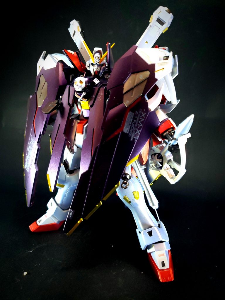 スカルヘッド・ユニット両肩部のアーマーを改造し、X3用の部品を流用したIフィールドジェネレーターを左右合計で4基内蔵したビーム防御装置。片側2基のジェネレーターと、歯のような形状の上腕部のプロテクターによって、頭蓋骨のような外観をしている。左右4基のIフィールドジェネレーターを交互に利用することで、エネルギーが続く限りという制約と防御範囲が狭くなるといった問題はあるものの、使い方次第でIフィールドを常時張り続けられる。シンヴァツからの脱出時における光のカリストとの戦闘中には、トビアがとっさの思いつきでナックルガードとしても使用している。このスカルヘッドをナックルガードに転用した打撃は、X1フルクロスが各種ゲーム作品に登場する際に攻撃方法として採用されているが、原作中ではIフィールドを利用して敵のビームアックスを相殺しつつ、ヘッドの下のブランド・マーカーを打ち込むための隠れ蓑として活用したもので、攻撃の際にスカルヘッドは消し飛んでおり、本来想定された使用方法ではない。