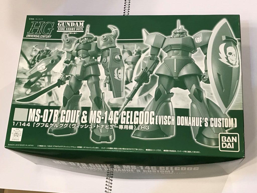 キットはこれ。中身は1/144旧HGUC MS-07B グフ。自作デカールのスキャン原稿になるマーキングシールが付いてるのはいいのですが、３連35mmガトリング砲は付いてきませんでした。なのでガトリング砲とシールドはHGUCグフカスタムから。