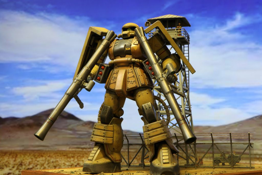 ジオラマに立たせて背景の前で撮影。