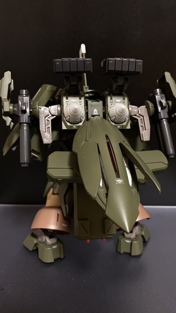 追加されたユニットにより、二つのGNドライブが追加されトリプルドライブとなる。(背中のGNドライブに背部ユニットがかぶさって接続されている設定)GNミサイル　10発×2二連装GNキャノン ×2リアスカート内側にシュツルムファウスト ×4大型GNファングコンテナ ×1ビームアサルトライフルの入ったケースを担架している。