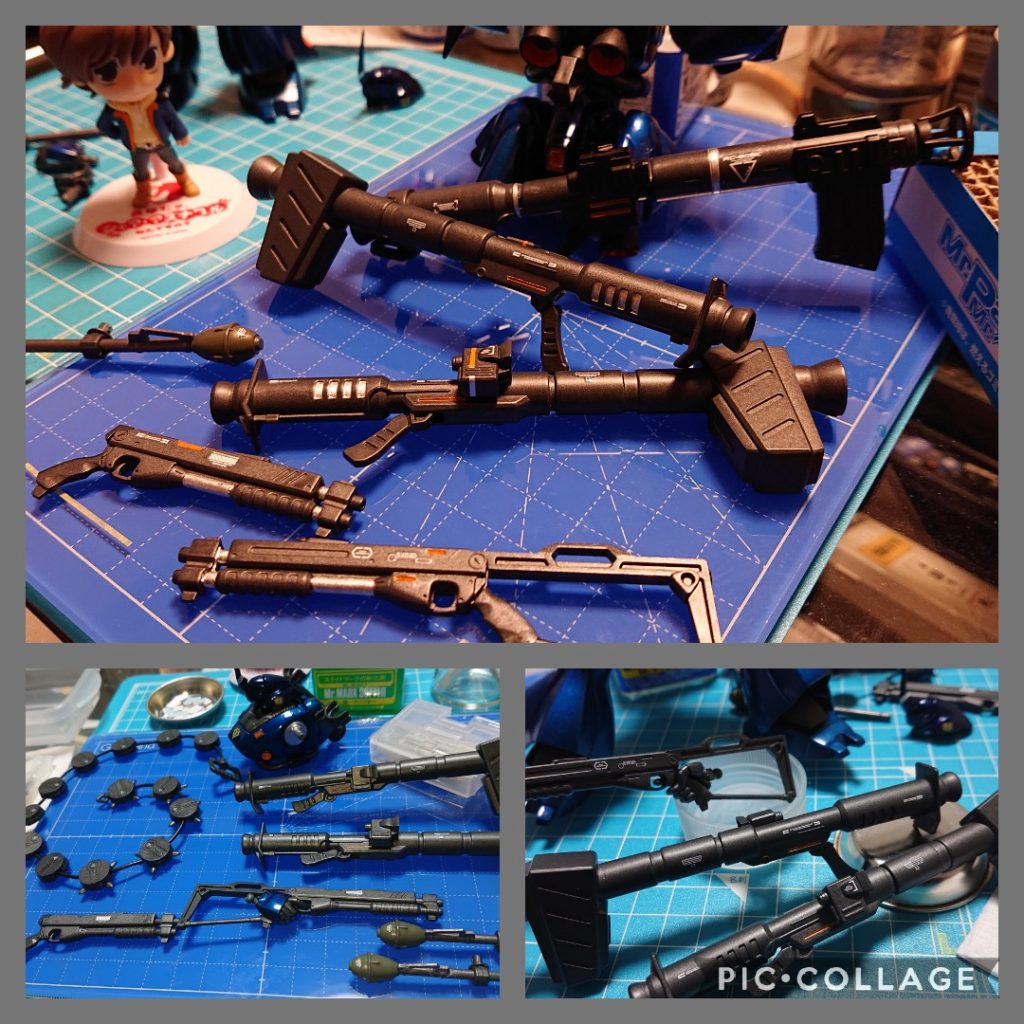 水転写デカールは「どこに」「どれだけ」「どんなものを」貼るか(または貼らないか)、自由度が高過ぎて(この後のウェザリングもそうですが💦)優柔不断でビビりな自分にはとても手強い工程に思いました😧そして色々調べて悩んだ結果、今回は武器のみに貼って本体は情報量あまり増やさない方向で進めようと決めました(この時点ではウェザリングもするかしないか迷ってました)。実際にデカールを貼りはじめたのですが、最初はけっこう失敗しました😧💦右手と左手の使い方や、いつ台紙から剥がすかなど、他にも貼り付けた後の位置調整がうまくいかなかったり(爪楊枝は動かしづらく、筆だと動き過ぎたり等)ちょっと心折れかけましたが、なんとか粘って以下の方法に落ち着きました(自分なりの手順です)・ぬるま湯に3秒程つけてからティッシュ上に置く・その間にマークセッターをほんの少しだけ貼り付ける部分に塗る・右手にピンセット、左手に爪楊枝を持つ・ティッシュの上でピンセットを使って台紙からデカールのみをつまんではがす・ピンセットと爪楊枝でデカールを貼り付ける(置く)・爪楊枝を右手に持ち変えて位置調整・場所が決まったら少し湿らせた綿棒をコロコロ転がして余分な水分を吸収する・乾燥したらマークソフターを少し塗って、また綿棒コロコロ ※マークソフターについては使い方再考の余地ありです。。なんとかこの方法でそれっぽく貼ることが出来ました。なお、いざ貼り終えてみると武器そのものがあっさりしているような気がしてしまい(写真下段の状態)、追加で部分塗装を施しました(写真上段)。現時点では引き算の技術力を持ち合わせていないため、とりあえず付け足し付け足しの精神です😅💦