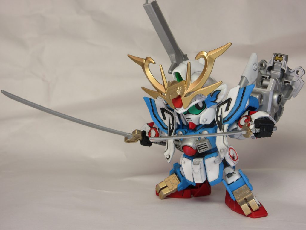 ゴッドガンダムの後継機がないので（実はある）、武威丸のモチーフであるVガンダムの発展期、セカンドＶを號斗丸の息子設定で作成しました。最初は飛駆鳥と號斗丸のコンパチでまとめようとしましたが、・フロントアーマーがVガンダムと全く違う・サイドアーマーがV2の2点はどうにかしかったので、結局HGUC2体も使用しました。赤ラインはわずかなセカンドV感最初の予定は翼なしでした。 