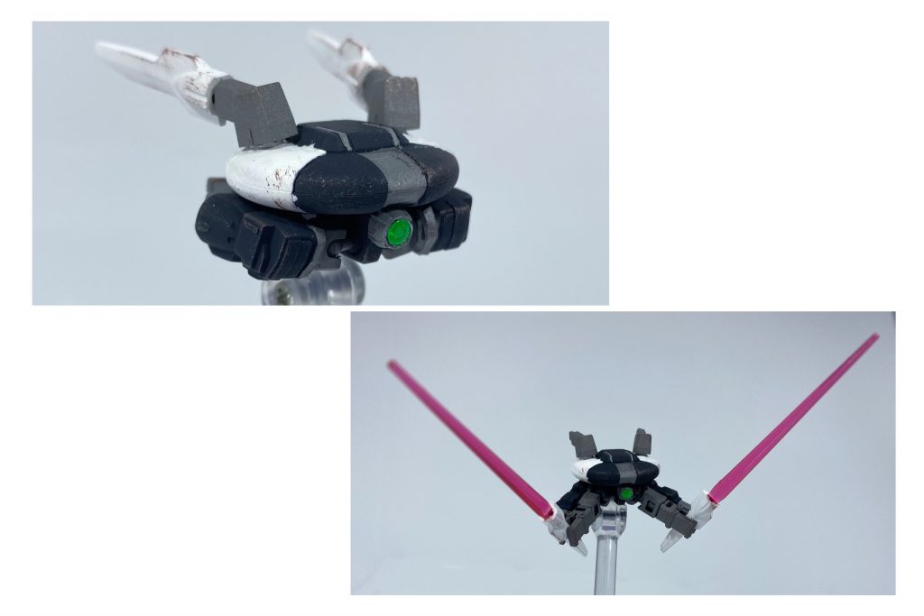 近接用戦闘ドローンCo/HALNi/FRITHの支援用に用意された近接戦闘用ドローン。旧キットアッシマーに付属するMA形態モデルをベースに制作されており、AOZのキハールⅡのイメージを重ねている。本来は完全な無人機として制作されていたが、のちにまるいるか(ルント)がGBNの中で出会ったエルダイバー、AMDAに提供されており、現在は彼の乗機となっている。非常に小型ではあるがAMDAの卓越した近接戦闘スキルとの相性が良く、戦闘力は高い。