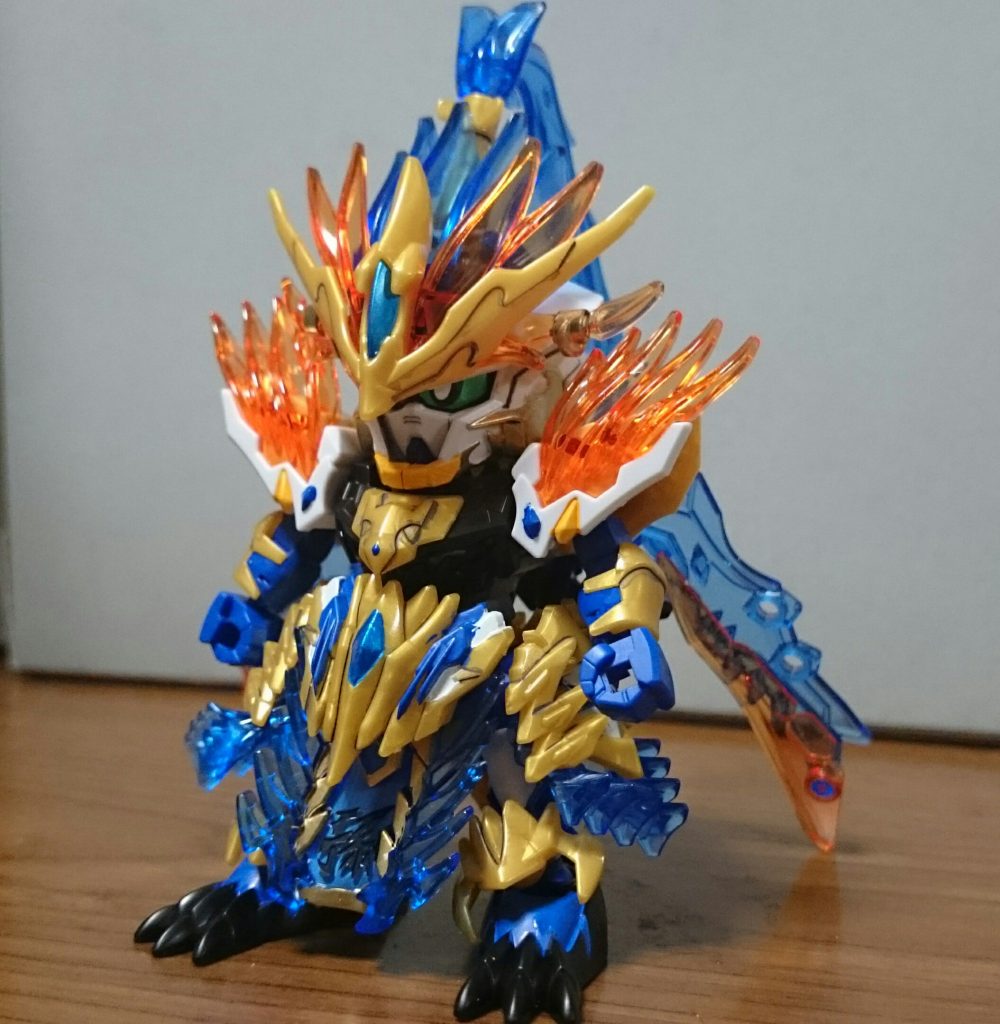 ・孫策ガンダムアストレイ「三国伝」ではGP02が演者だった孫策。今作ではブルーフレームが演者スね。「三国伝」では孫一族の演者はGP01～04で固められていて、「創傑伝」では孫堅・策・権がそれぞれアストレイの金・青・赤、尚香がストライクルージュと関連はあるけど、直で連なってるわけではないっスね