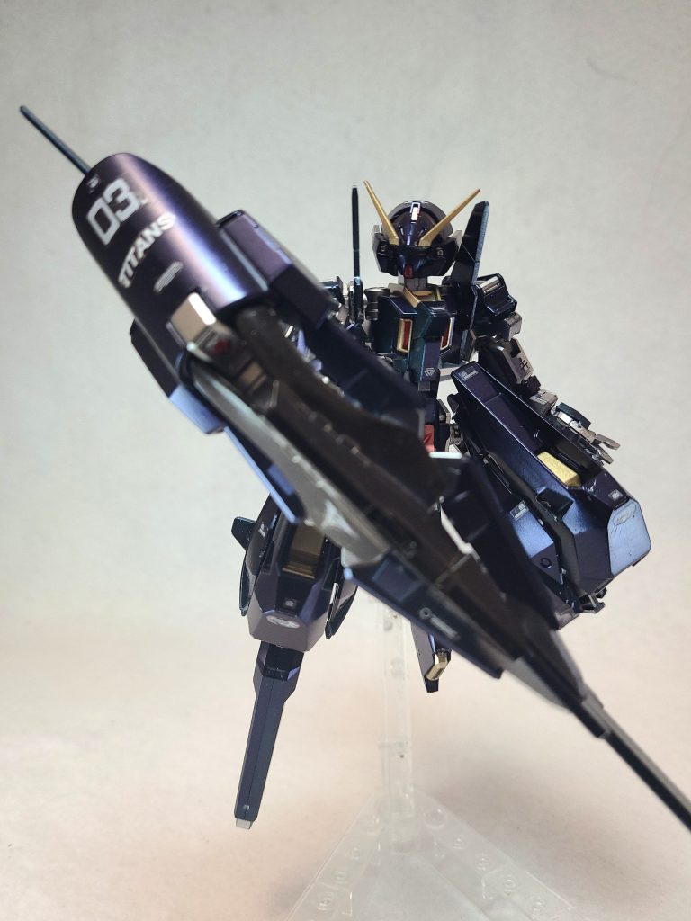 BUNNyS本機に搭載されている特殊なOSで、カタカナ表記は「ヴァニス」[10]。『ガンダムエース』2003年7月号掲載の藤岡による短編漫画「OVER THE MIND」（のちに『くろうさぎのみた夢』単行本第1巻に再録）で開発経緯が描かれ、『ティターンズの旗のもとで』では藤岡によるメモで触れられただけであったが、『A.O.Z Re-Boot』および『くろうさぎのみた夢』で設定が明確にされた。「OVER THE MIND」では、連邦軍の次期主力量産機に搭載予定の、「3号作戦」と呼ばれる計画で開発されている戦闘データ・システムが、被験者である強化人間の「心」をデータ化して蓄積し、その命が潰える瞬間に完成するものであることが語られ、最終的に被験者の少年がガンダムそのものになったかのような結末が描かれている『ティターンズの旗のもとに』に掲載された藤岡のメモでは、上記「OVER THE MIND」に触れつつ、作中でロックオンしただけで本機が一瞬にしてMS3機と戦艦1隻を自動追尾して破壊する描写について、本機には「OVER THE MIND」計画（通称「3号計画」）で開発された「強化人間人格OS」が搭載されているためであると説明している。ただし、OS搭載を明言するのが問題であれば、そういうOSの計画もあったらしいという程度の扱いでよい旨も記されており、結局同企画では明文化されなかった。