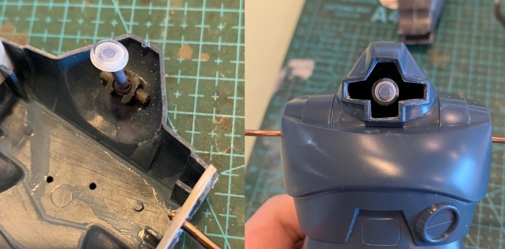 モノアイ部制作中の様子です。後頭部内側にボールジョイント基部を接着し、そこに軸の先にレンズパーツを付けた部品を着けました。レンズパーツの取り付け角度調整がキモでした。がっちり付いているので大丈夫だとは思いますが、胴体を貼り合わせてしまっているので万一外れると修復は絶望的です(苦笑)最後までご覧いただきありがとうございました。