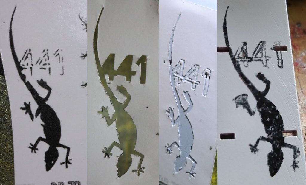 白のシールに印刷したものを切り取り、パーツに貼り付けてスタンプのように塗料をつけ、はっきりとしたものではなくダメージを受けているような感じにしました