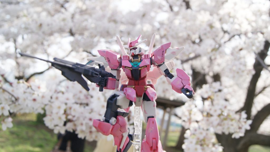 本物の桜をバックに撮影しました。