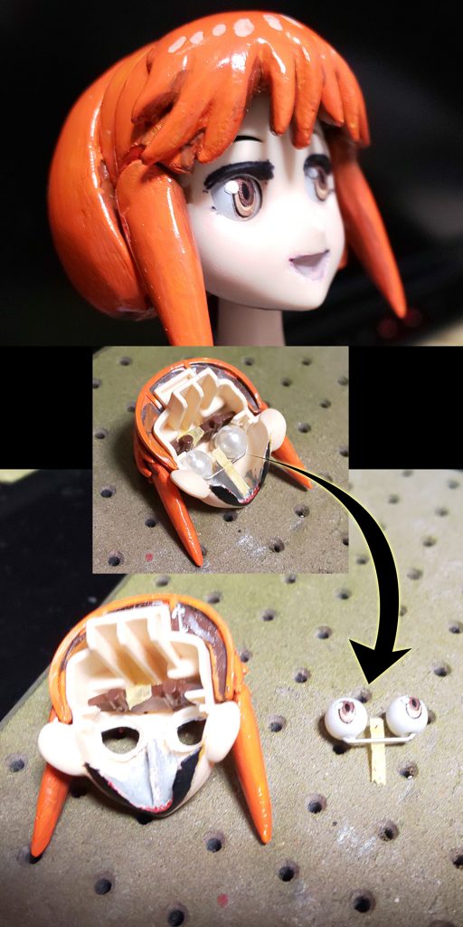 ドールアイ化の練習も兼ねているのです。目の位置を6mm球サイズに削って、今回はドールアイ代わりに6mmビーズにシール貼り付けして固定。それから、横髪は周囲に干渉するのでバネ可動を仕込んであります。