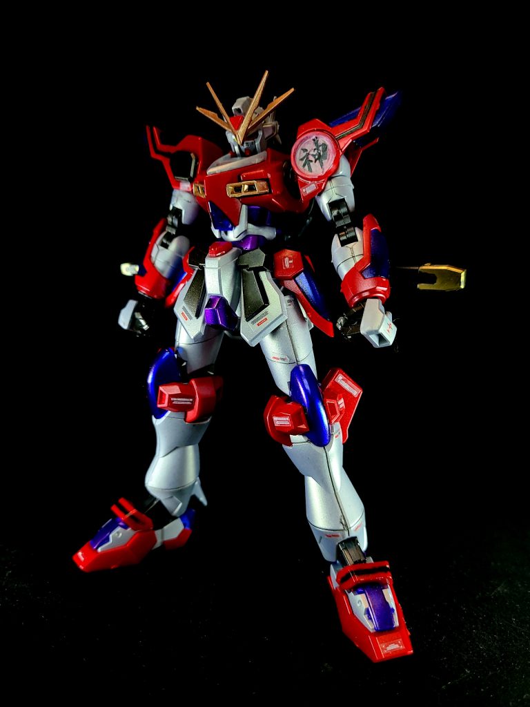 『アイランド・ウォーズ』では、左肩には「神」の文字からビームを出して敵を薙ぎ払う機能や、僚機をプラフスキー粒子と化して自機と融合させる新機能を搭載しており、対スクランブルガンダム戦では落下してくるコロニーすら食い止める圧倒的なパワーを発揮。さらに黄金神スペリオルカイザーを召喚し、スクランブルガンダムを一撃で倒す。