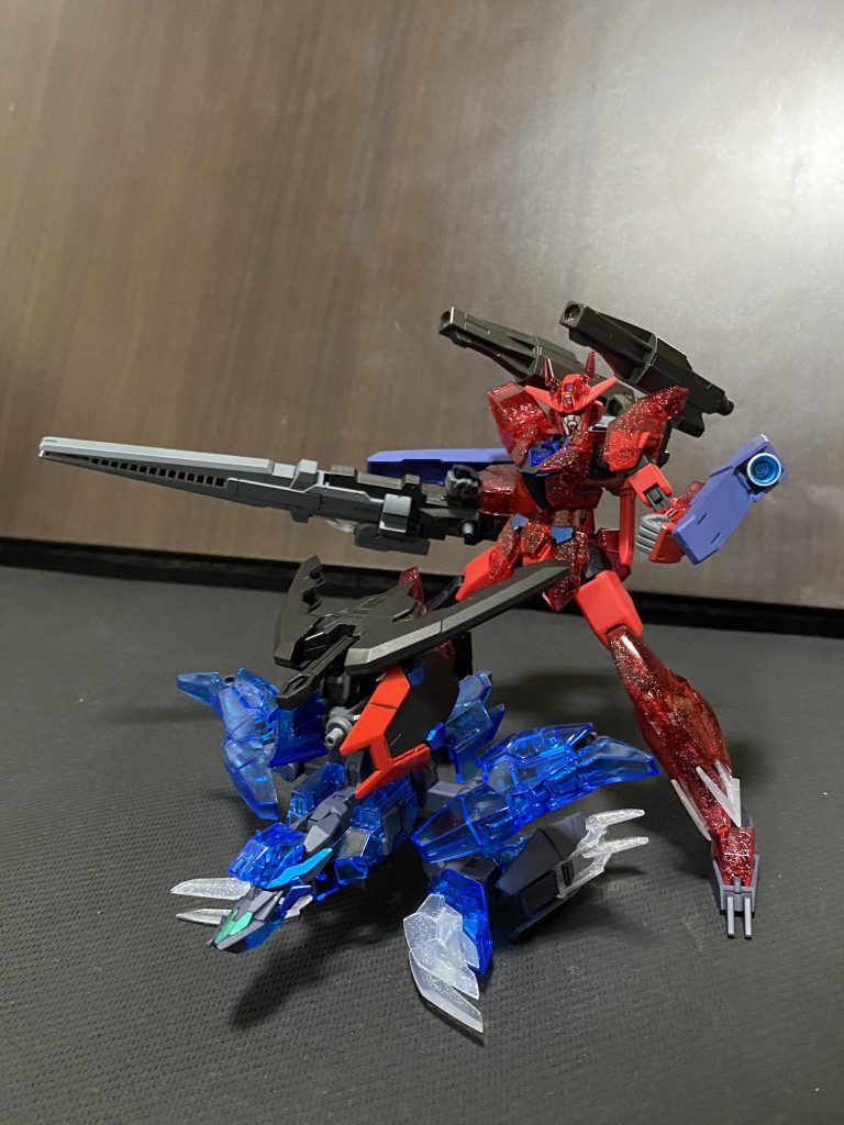 マーズバーニングガンダム バスタースタイル高出力バレルと実弾のショートバレルキャノンに加え腕部ブースターを装備した重火力形態で、ギャプランのシルエットを意識したブースターで機動性をカバーするほか劣悪な地形でもホバーで動けるように。