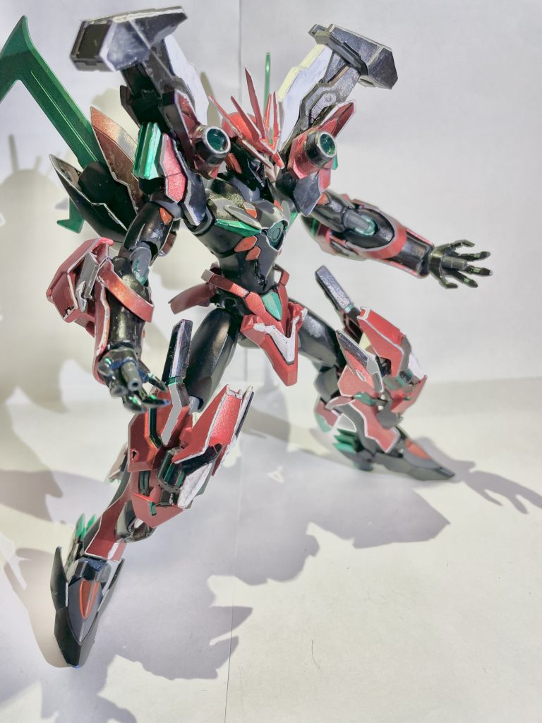 GBN内での本機の必殺技は胸部、肩部に搭載された大型粒子砲3門から放たれる「トライバースト」