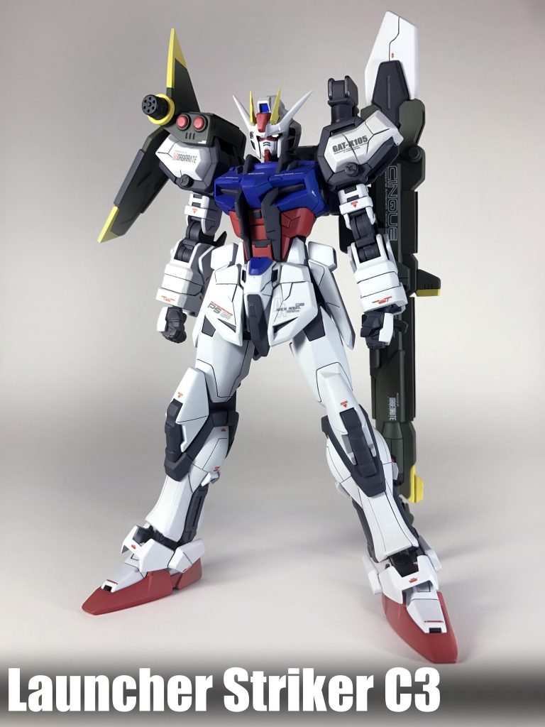 ・AQM/E-X03-C3 ランチャーストライカー改3式「AQM/E-X03 ランチャーストライカー」の改良型。C.E.73年、ユニウス条約締結後に開発された、遠距離砲撃戦用ストライカーパック。ストライカー本体にブースターを増設、機動力低下を補っている他、『320mm超高インパルス砲「アグニ」』運用上の欠点であったエネルギー消費問題を根本的解決に至れなかった為、「AQM/E-YM-1 マルチプルアサルトストライカー」に搭載されていたものと同様の「追加バッテリーパック」を装備し、継戦能力を強化しています。