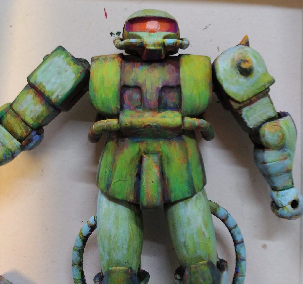 下地の上から、少しずつザクっぽい色を乗せていきました。