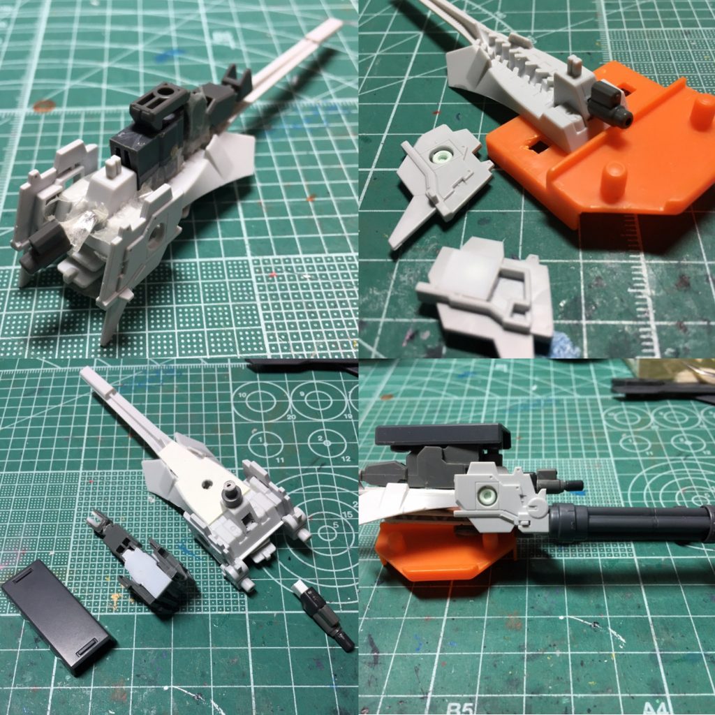 ③メガ粒子砲装備シールドはTR-1系のジャンクパーツ主体に製作。ご存知の方が多いと思いますが、ハイゼンスレイ系の機体ではカバーパーツのランナーが無いのでウインチキャノンが組めません。アームの使い道は見出せますがキャノン本体はどうにもならないので、追加武装という扱いにして作りました。　銃口はEz-ARMSで余る銃口＋ジム・クゥエル製作時に加工したライフルの銃口から。左右バインダーはFGのプリムローズから。小型ジェネレーターという体で作った機関部はハイゼンスレイ・ラーⅡで余るフルドドⅡ拡張セットなどのパーツ。装甲板はボールデンアームアームズ付属品です。　ウインチユニットの基部はFG＋ハイゼンスレイの余りで、当初は使う予定がなかったのですが、パワードアームズパワーダ―と並行で製作していたら、3mm軸で規格が共通だったため、遊びの幅を広げるために用意することに。