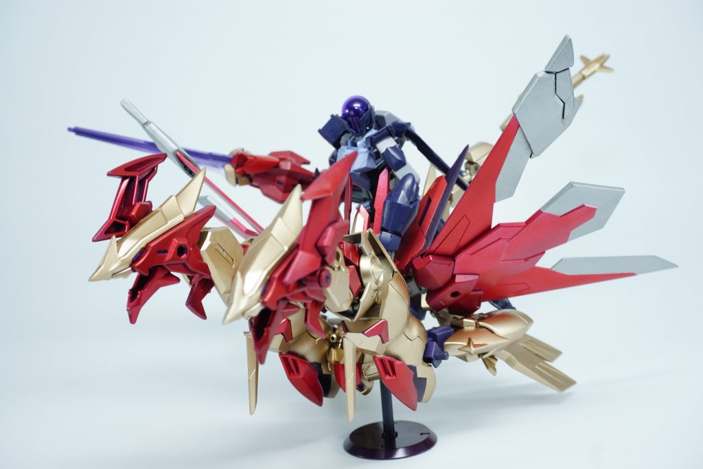 アルスコアガンダムが登場し、クアドルンとテルティウムガンダムのように飛び立つこともヒロトのコアガンダム系とカザミのナイト系がベースにされ生み出され、パルのヴァルキランダーに対抗するように騎士ガンダム系の神の姿となり、メイのウォドムポッドやクアドルン達のように連携し攻撃を行える多様性まさにガンプラの民、ビルドダイバーズとの戦闘経験の末生み出された、アンチビルドダイバーズとも呼ぶべき機体であるかつてエルドラを守ったアルスの姿はそこにはなく、破滅をもたらされるのはビルドダイバーズか、はたまたアルス自身か……