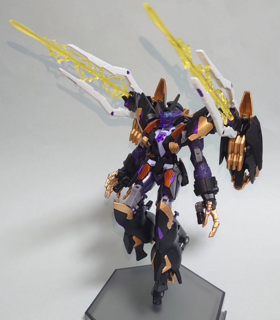 ・ハイクロノスキャノンバックパックに装備されたブースター兼用の大型ユニット。ゼルトザームもといテルティウムガンダムから解析した技術が転用されており、テルティウムの脚部ユニットに形状が酷似している。ユニット内部にはコ・ジェネレーターが搭載されおり、高い出力を誇るだけでなく、連続使用を行っても本体がパワーダウンしないように設計されている。アルスアースリィのビームライフルを応用した砲身を持ち、メインの機能となる射撃形態時はジェネレーターから直接エネルギー供給を受けることで高い威力を発揮する。また、ユニットには大型の光波推進装置が複数取り付けられており、高機動形態時はジュピターヴガンダムにも匹敵する機動力を発揮する。後部にはテルティウムと同型のビームガンも備えており、後方への迎撃手段として機能し、特に高速戦闘で真価を発揮する。