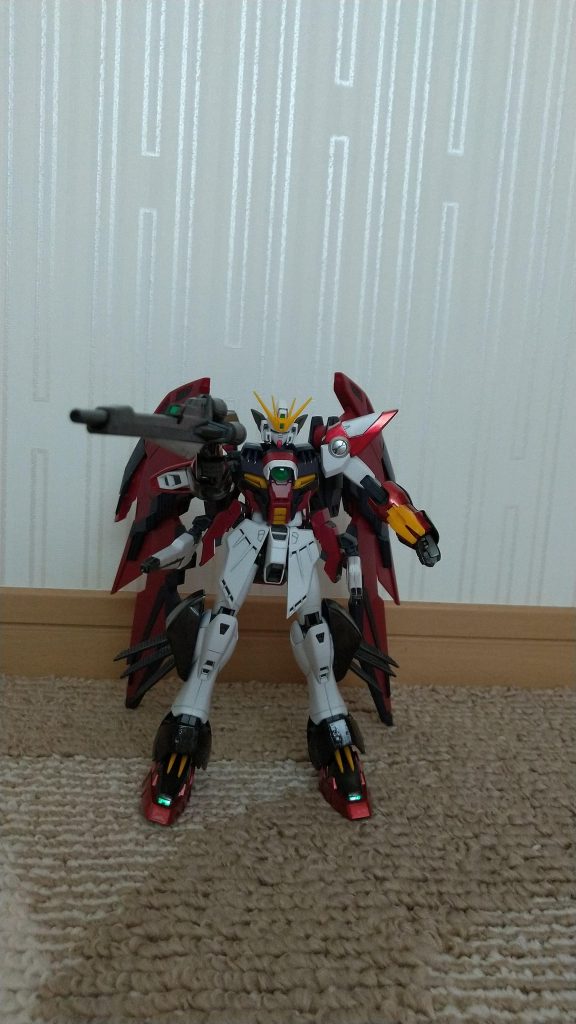 AC.195年、サンクキングダムを占拠したOZは放棄されていたウイングガンダムを発見。その後、トレーズ・クシュリナーダの元に密かに送られ、後に開発される事になるガンダムエピオンのテストベッドとして開発されたガンダムが存在していた……。それがこのガンダムワイバーンである。本機はウイングガンダムをベースに、ガンダムエピオンの為のデータ収集を目的とされており、後にガンダムエピオンとして使われる、ゼロシステムといった新システムや各新規のパーツのテストも行われていた。武装はバスターライフルと、ウイングガンダムのシールド、ガンダムエピオンのシールド兼ヒートロッドの他に、どこから調達したのか、新たに用意されたヴェスバーが腰部左右に１基ずつ、さらに脚部にはゼロシステムなどの新システムによる熱を逃がす為の放熱フィンが増設。