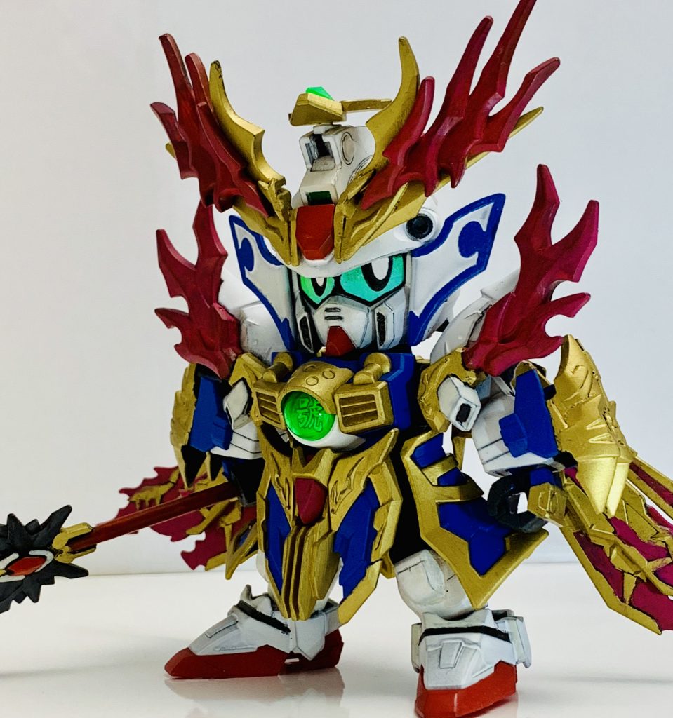 顔とボディはそのまま使おうと思っており、ツノ飾りを２つのものを組み合わせて作成。背中のパーツは炎皇バージョンの張飛ゴッドから拝借。閉じることでマントみたいな見た目になって貫禄でたのも◎