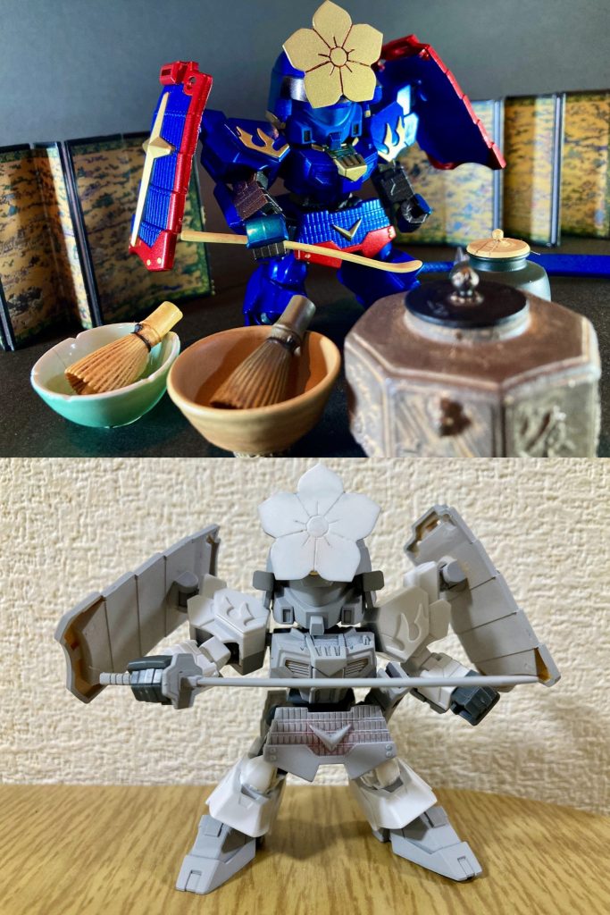 今回、アニメ登場デザインの厳密な再現ではありませんが、雰囲気モチーフを基にオリジナル要素を詰め込んで製作させて頂きました。頭部は三国創傑伝部隊兵のジェガン顔を使用し、特徴的な桔梗紋前立パーツはプラ板を切り出して自作しました。大変肩が凝る作業でした。