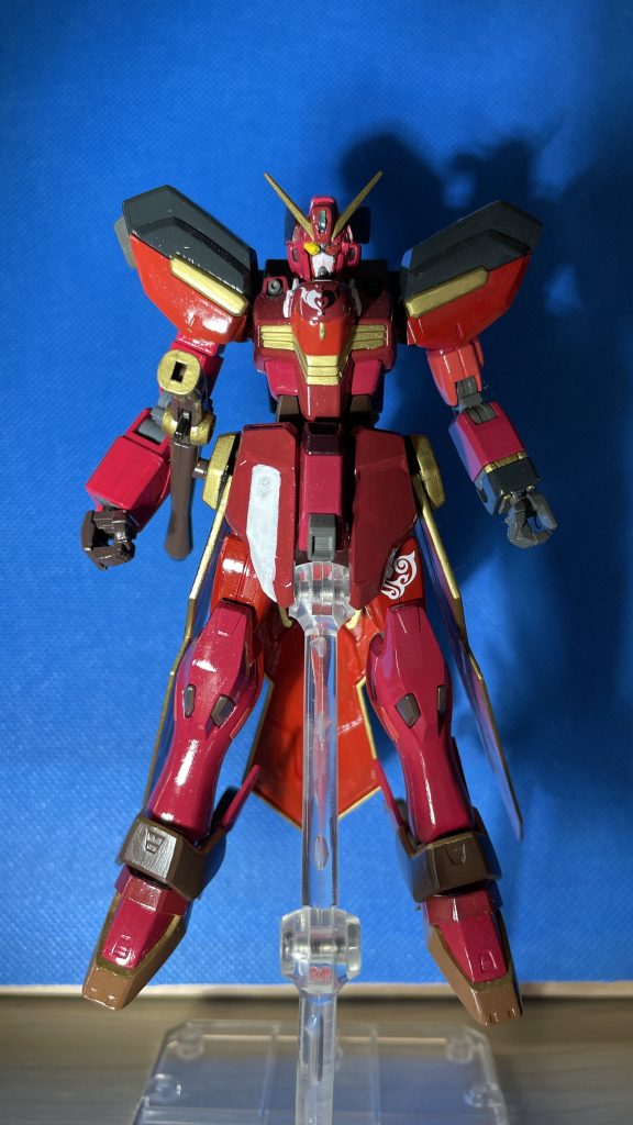 カラーリングはモデルの人物の衣装を元にしている。武装は現時点では、バスター・ガンのみである。